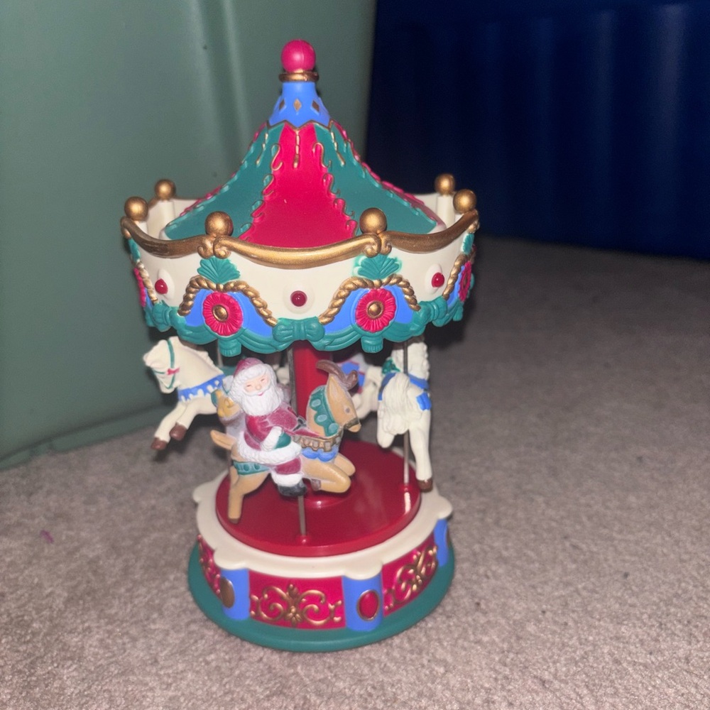 Vintage 1995 Avon Santa’s Caroling Carousal